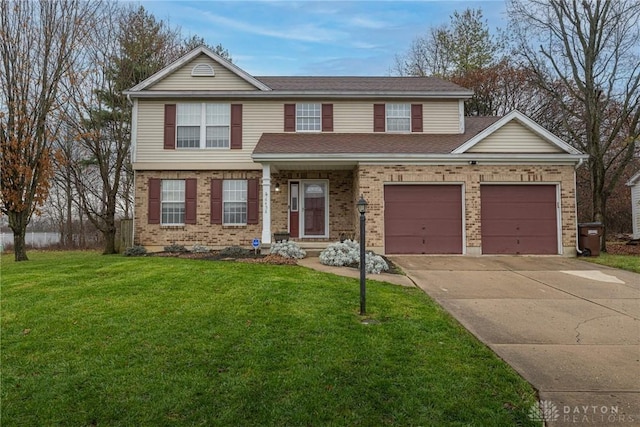 view of front of house with a garage and a front lawn