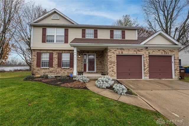 view of front of home with a front lawn