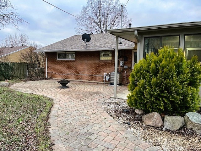 rear view of house featuring a patio