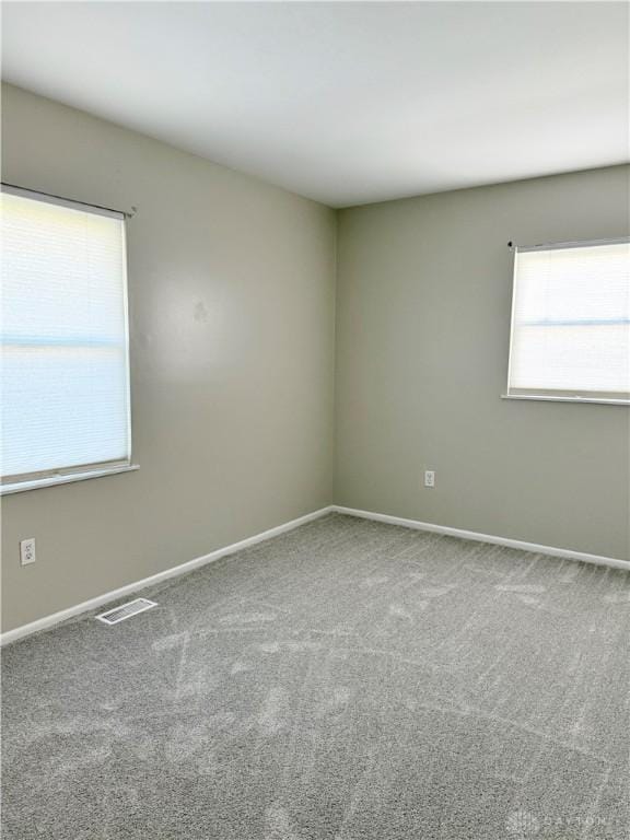 view of carpeted spare room