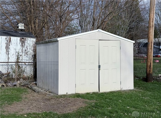 view of outdoor structure featuring a yard