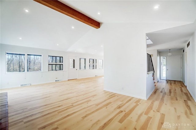 unfurnished living room with light wood-type flooring, lofted ceiling with beams, recessed lighting, stairway, and visible vents