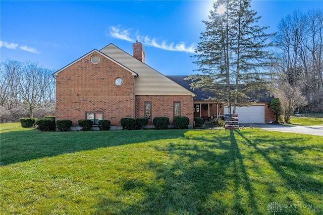 view of property exterior with a lawn and a garage