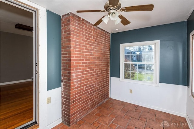 interior space featuring ceiling fan