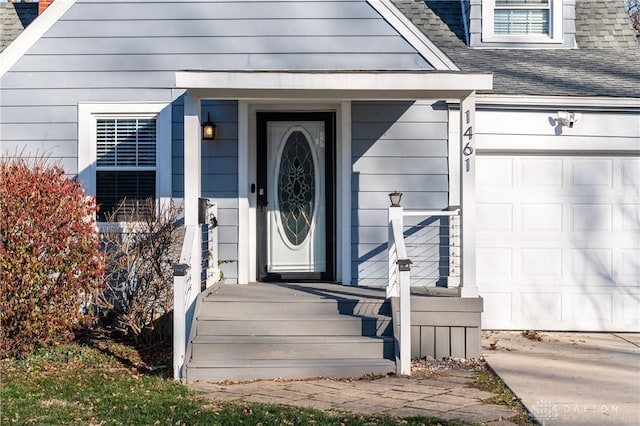 entrance to property featuring a garage