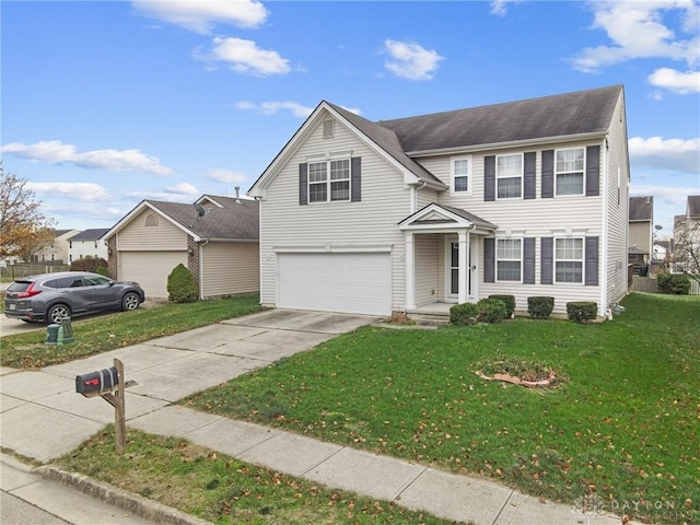 view of front of house featuring a garage and a front lawn