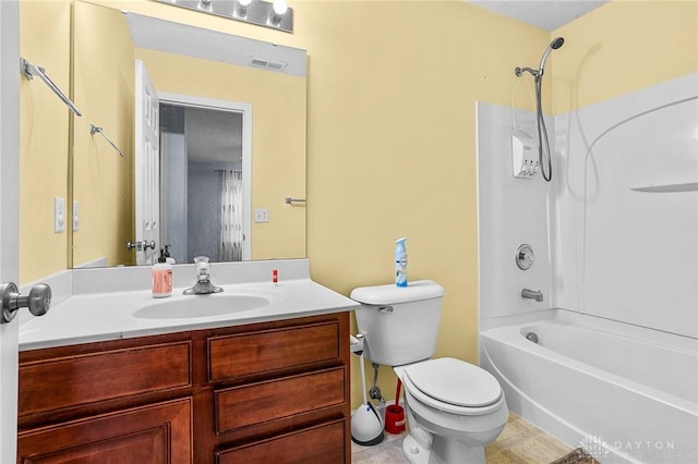 full bathroom with tile patterned flooring, vanity, shower / bathtub combination, and toilet