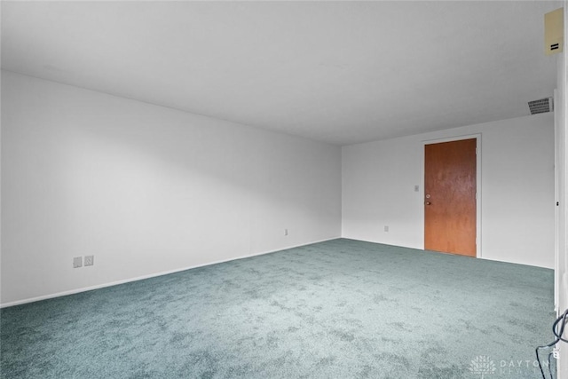 unfurnished room featuring carpet