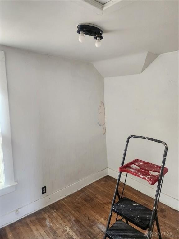 living area with dark hardwood / wood-style floors