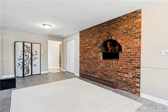 unfurnished bedroom featuring tile patterned floors and a baseboard radiator