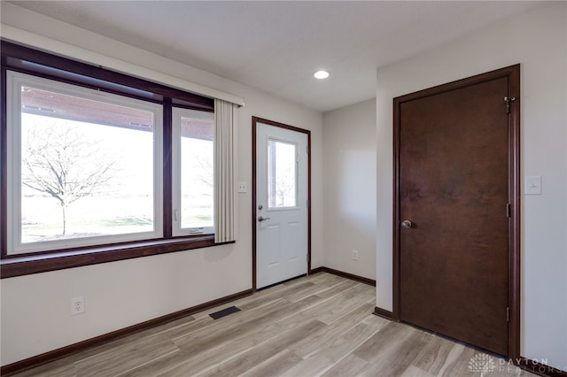 foyer entrance featuring light hardwood / wood-style flooring