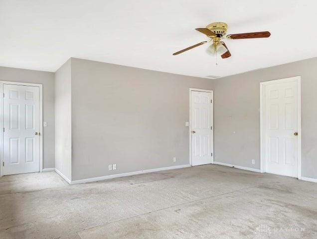 spare room with ceiling fan