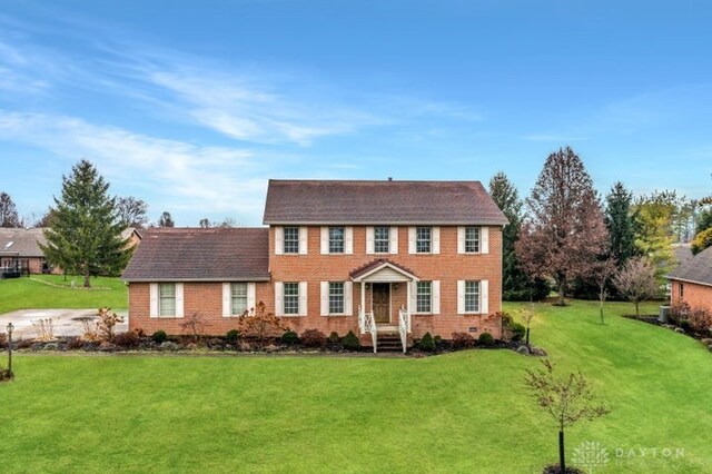 colonial house with a front yard