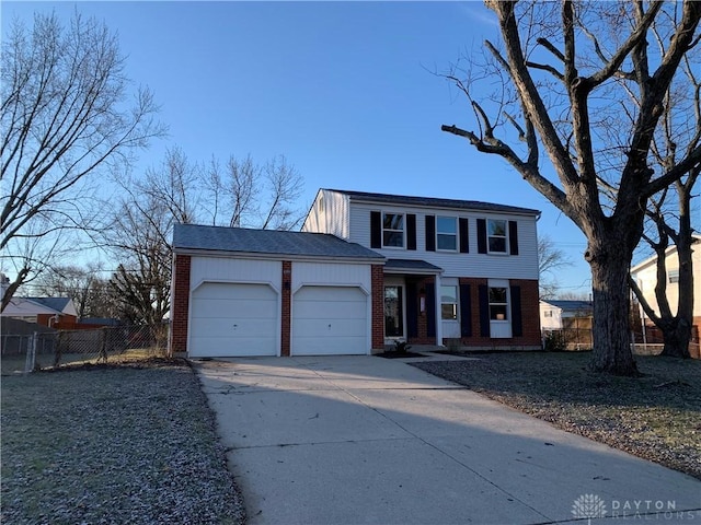 view of front of property with a garage