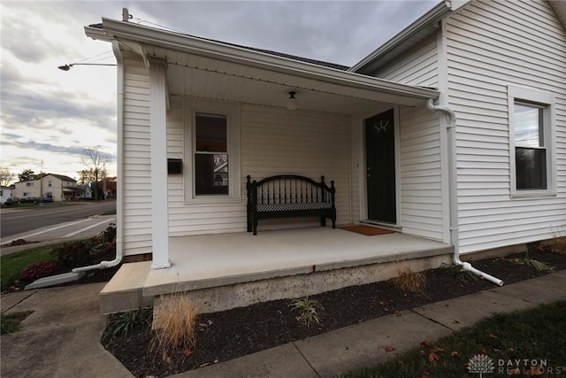 doorway to property featuring a porch