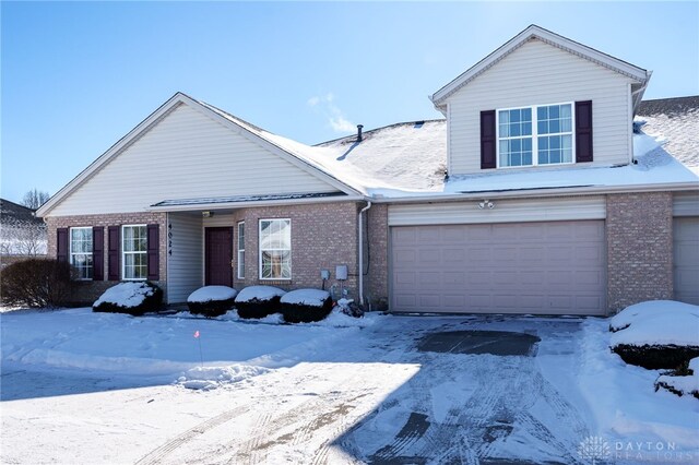 front of property with a garage