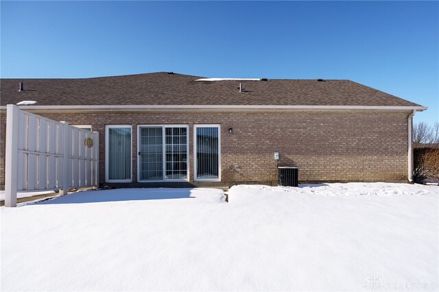 view of snow covered house