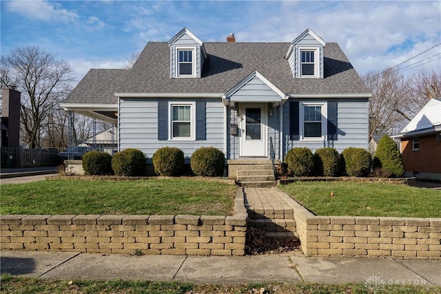 view of front of home with a front lawn