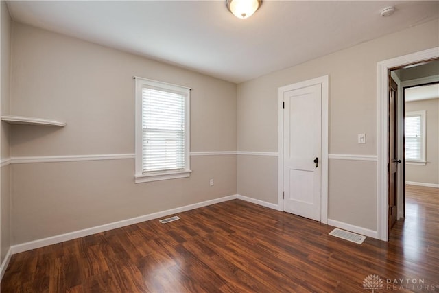 interior space featuring dark wood-type flooring