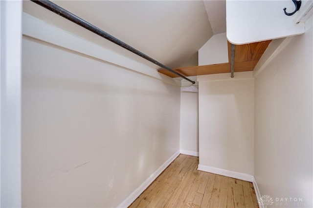 walk in closet featuring light hardwood / wood-style floors