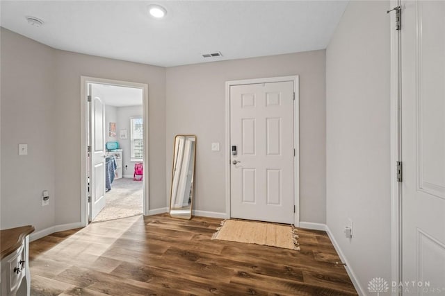 entryway featuring dark hardwood / wood-style floors