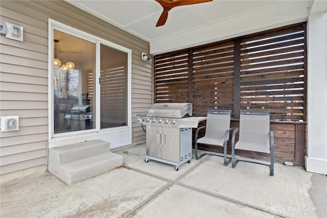 view of patio / terrace featuring ceiling fan and a grill