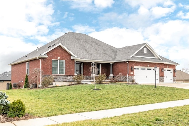 craftsman-style house with a front lawn and a garage