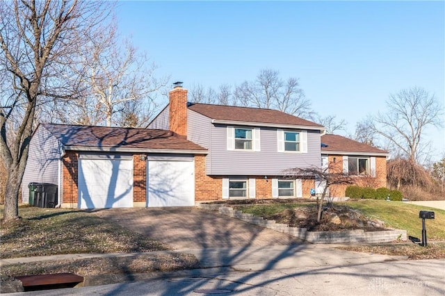 tri-level home featuring a garage