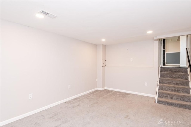 basement featuring carpet floors