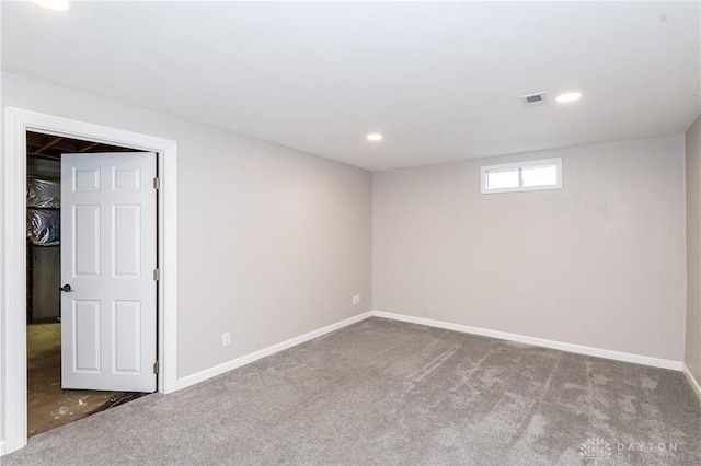 spare room featuring carpet floors