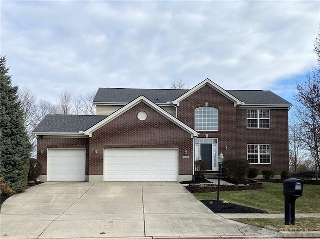 view of front of property with a garage