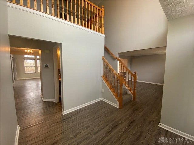 stairway featuring wood-type flooring