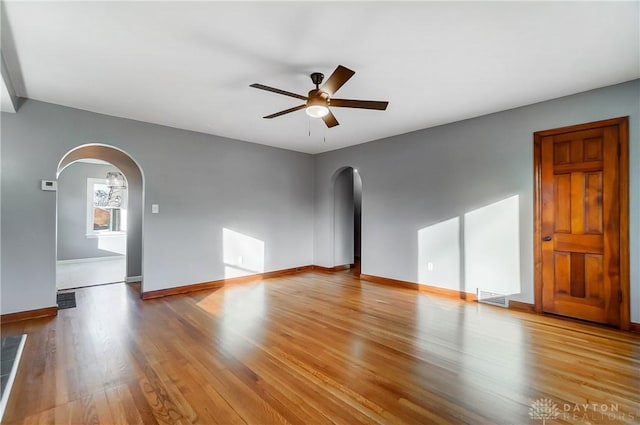 spare room with light hardwood / wood-style flooring and ceiling fan