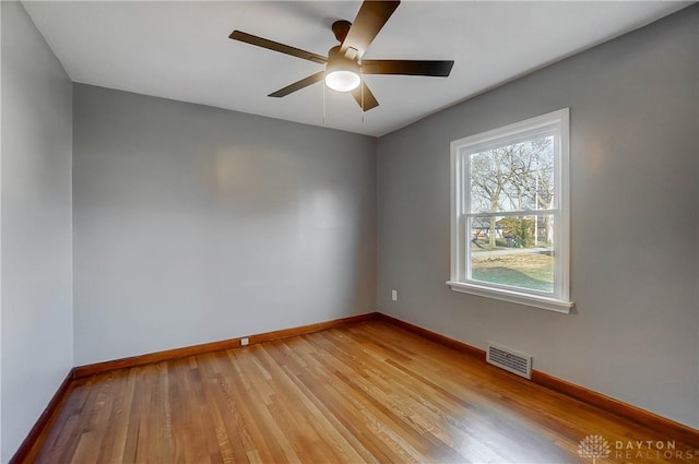 unfurnished room featuring ceiling fan and light hardwood / wood-style floors