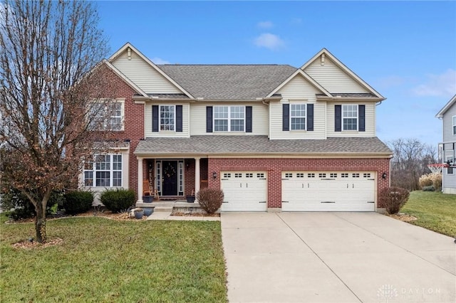 view of front facade with a front yard and a garage