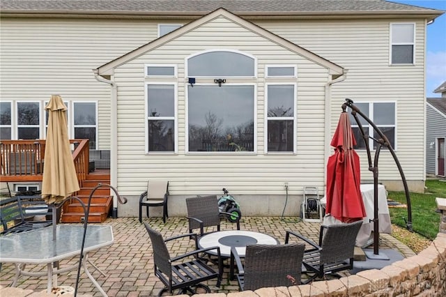 back of house featuring a patio