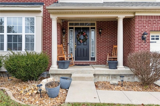 property entrance featuring covered porch