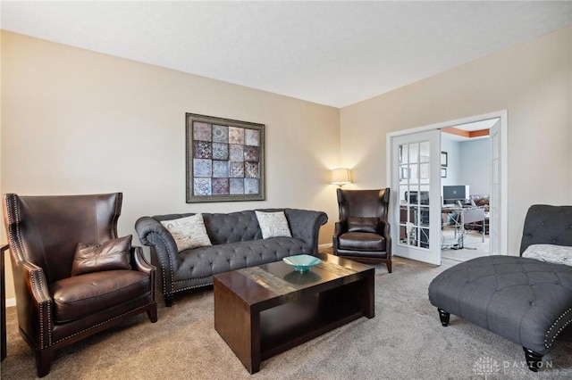 living room featuring french doors and light colored carpet