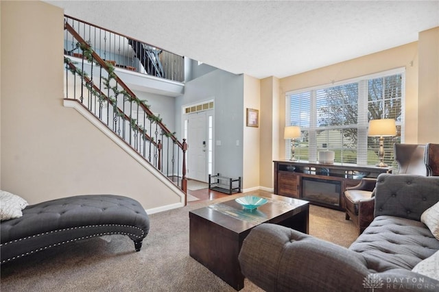 living room featuring light colored carpet