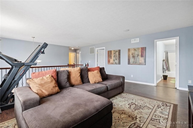 living room with dark wood-type flooring