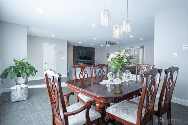 dining room with ceiling fan, recessed lighting, wood finished floors, and baseboards