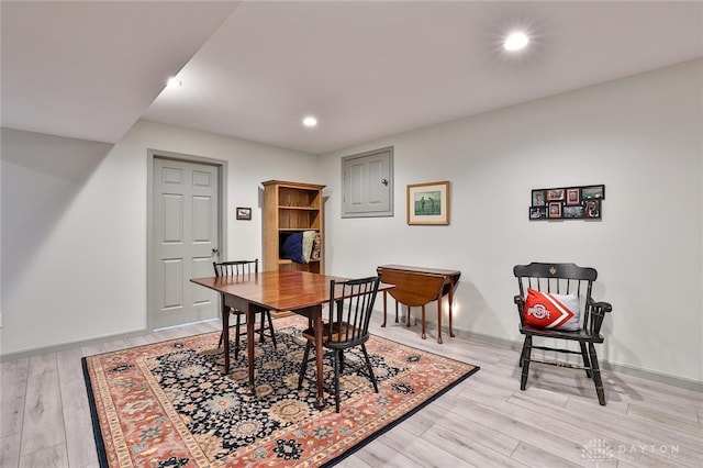 dining area with light wood-type flooring