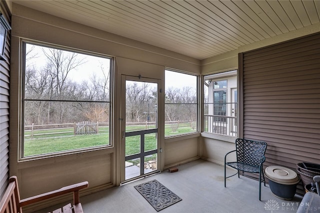 sunroom / solarium with wooden ceiling