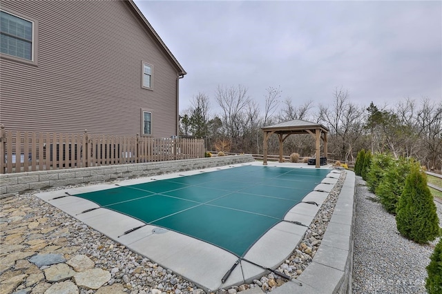 view of swimming pool featuring a gazebo