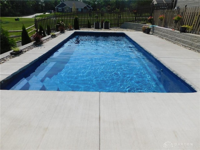 view of pool with a patio area