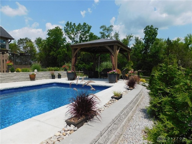 view of pool featuring a gazebo and a patio