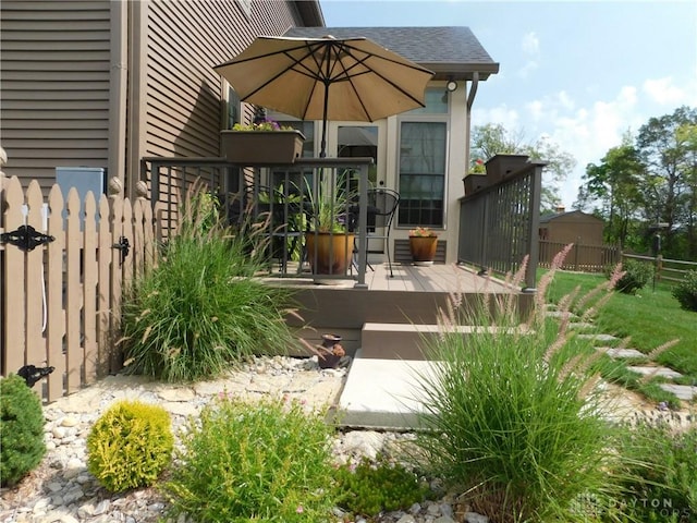 exterior space featuring a wooden deck