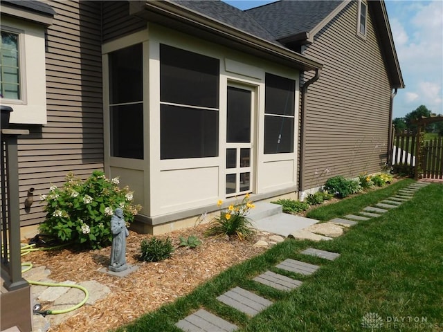 view of home's exterior with a yard