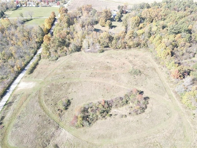 birds eye view of property featuring a rural view