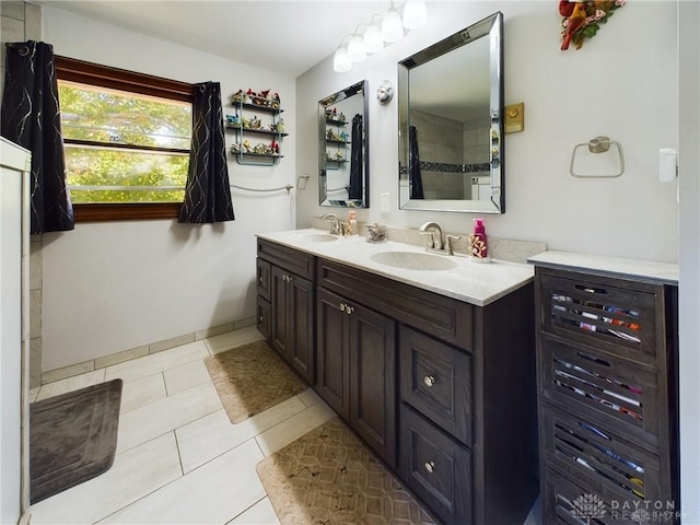 bathroom featuring tile patterned floors and vanity